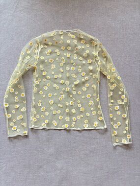 Yellow daisy sheer mesh top.